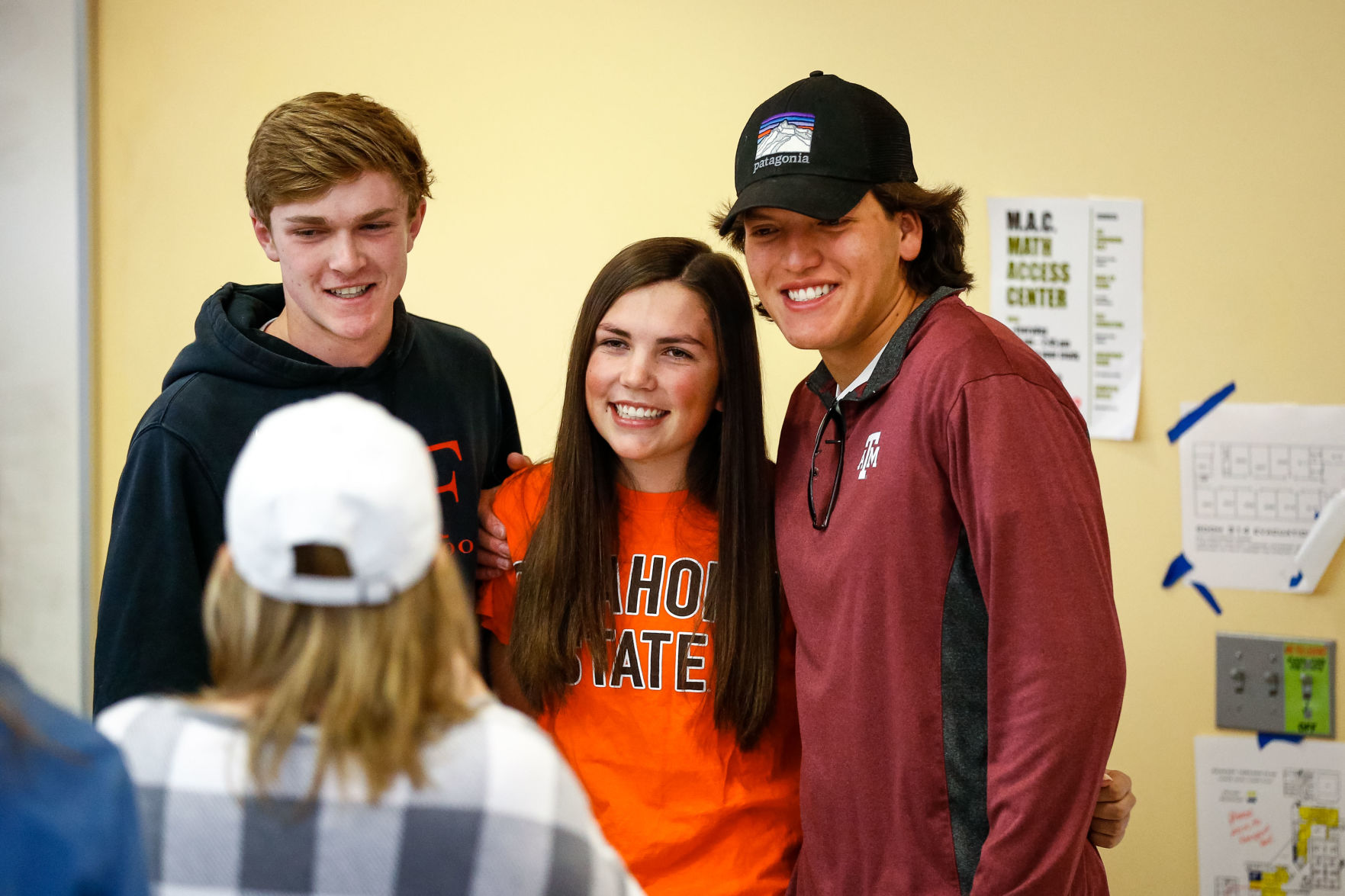 SIGNING DAY: Rampart athletes sign their National Letter of Intent